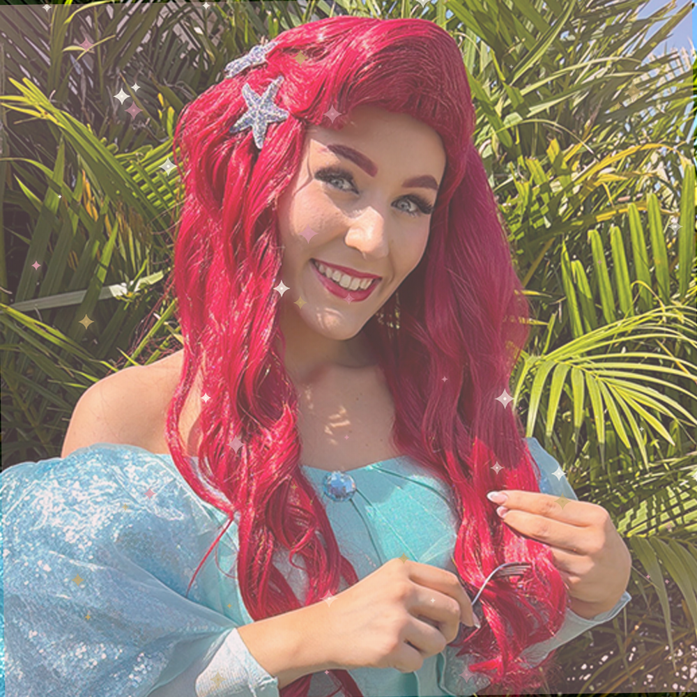 Ariel princess performer hosting a small floral tea party for young guests