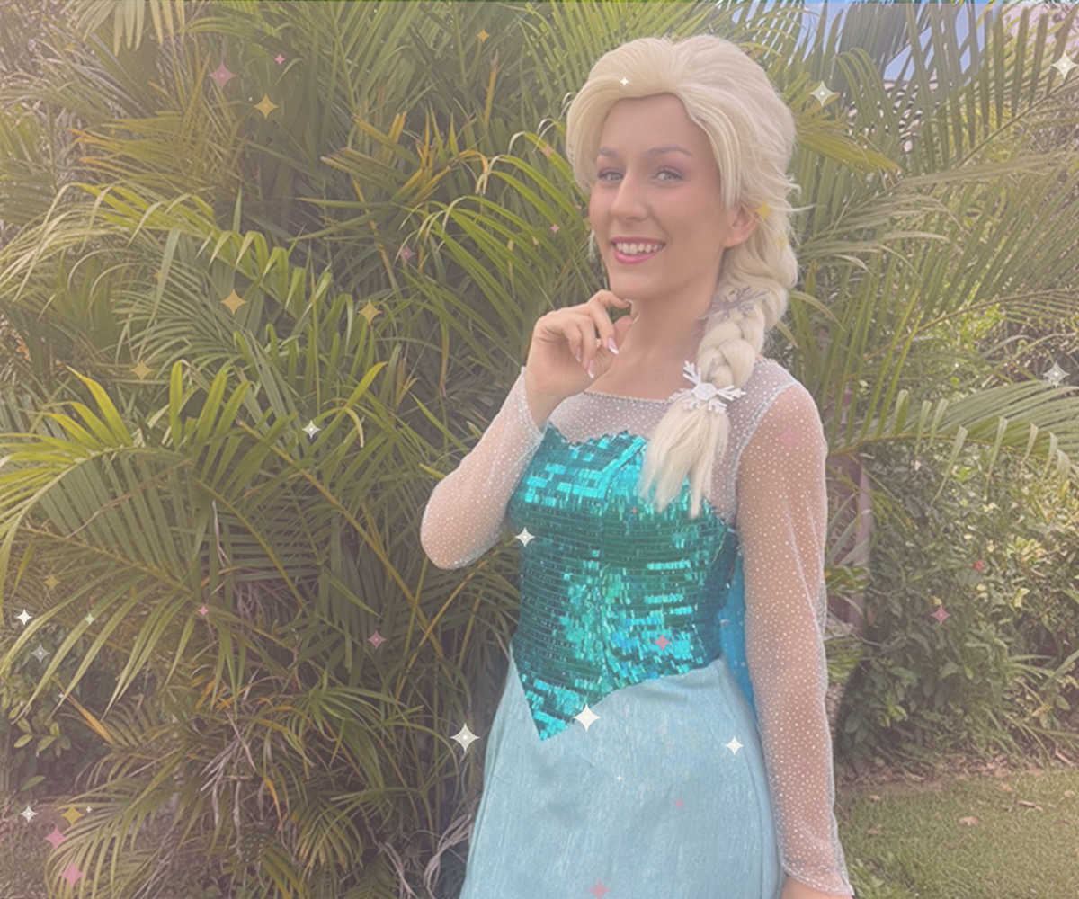 Princess character leading singing and dancing with young party guests