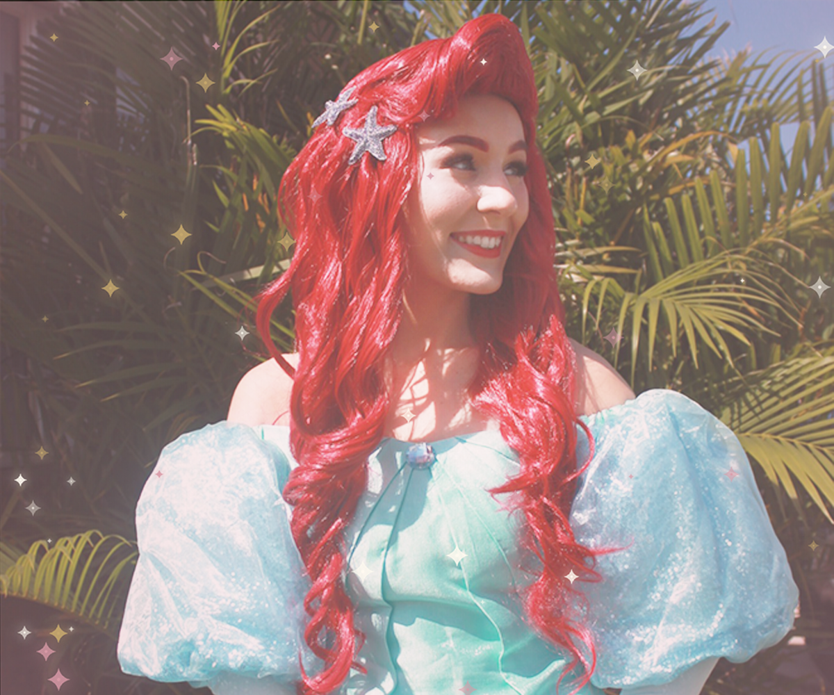 Two Wish Upon a ParTea princess performers smiling together at a fairytale celebration