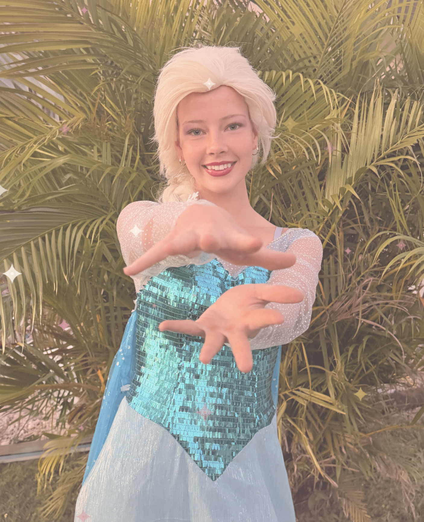 Snow Queen character performer in an icy blue gown